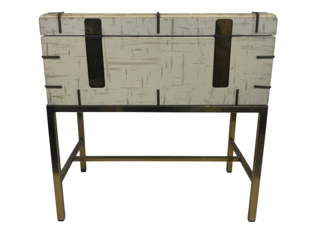 WHITEWASHED WOOD TRUNK ON BRASS STILTS IRON FIXES: WHITEWASHED WOOD TRUNK ON BRASS STILTS IRON FIXES - wood trunk on brass stands - dark black iron fixtures on top for deco effect - nice used condition - 19" tall msn By bidding on this listing, you un