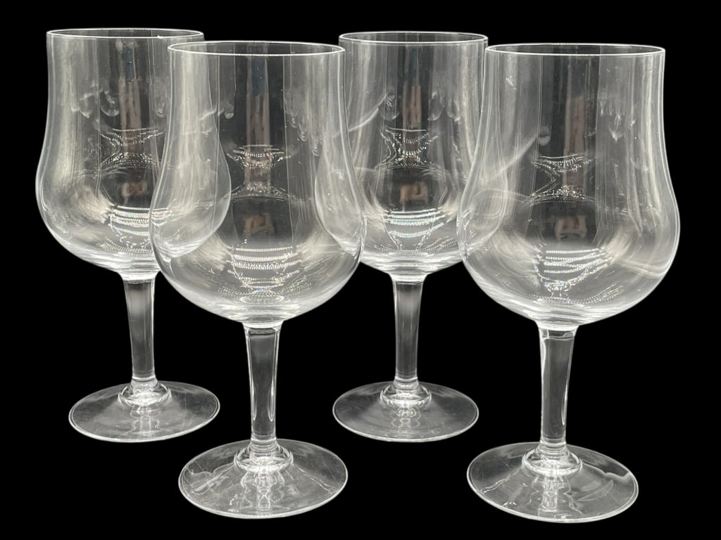 SET OF 4 CLEAR STEMMED LARGE WINE GLASSES 9": SET OF 4 CLEAR STEMMED LARGE WINE GLASSES 9" -Very good pre owned condition -Set of 4 glasses -Approx 9"h x 3"w -Elegant set of four clear glass goblets featuring a gently flared bowl shape, slender s