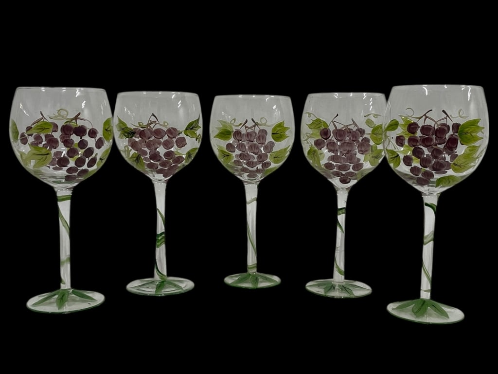 SET OF 5 HAND PAINTED FLORAL WINE GOBLETS: SET OF 5 HAND PAINTED FLORAL WINE GOBLETS -Charming set of five hand painted wine goblets featuring bright floral designs in coral, white, yellow, and green with coordinating painted stems and bases.