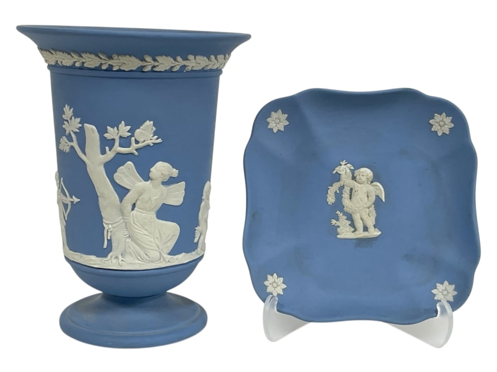 2 WEDGWOOD BLUE JASPERWARE PIECES: 2 WEDGWOOD BLUE JASPERWARE PIECES -Very good pre owned condition -Vase approx 5.5" tall, Trinket dish approx 4.5" -Beautiful pair of blue jasperware ceramics featuring classical white relief designs.