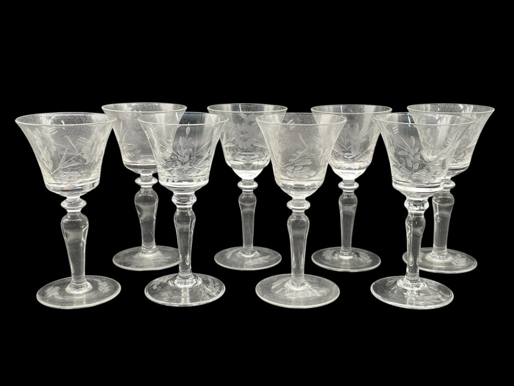 8 ETCHED GLASS STEMWARE W FLORAL DESIGN 4.5": 8 ETCHED GLASS STEMWARE WITH FLORAL & LEAF PATTERN -Very good pre owned condition -Set of 8 glasses -Approx 4.5"h x 2"w -This elegant set of eight vintage etched glass stems features a delicate floral
