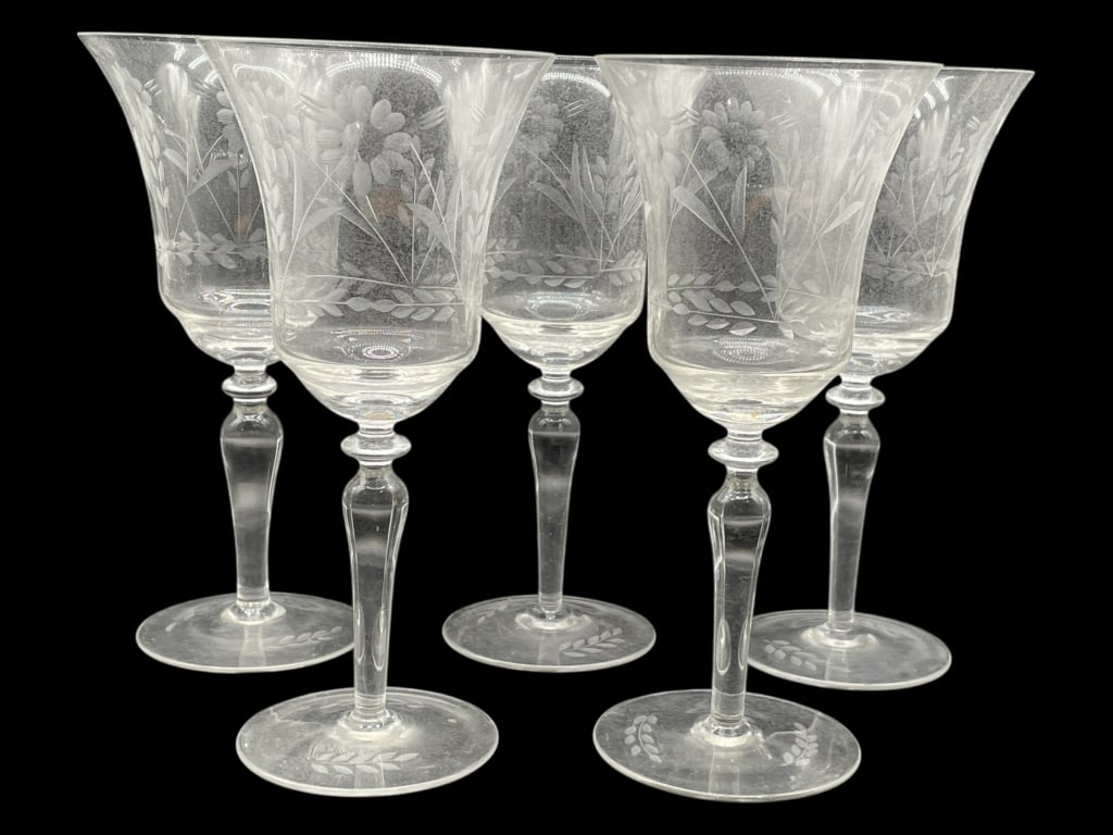 5 ETCHED GLASS WINE STEMS W FLORAL DESIGN 8": 5 ETCHED GLASS WINE STEMS WITH FLORAL & FOLIATE DESIGN -Very good pre owned condition -Set of 5 glasses -Approx 8"h x 3.5"w -Vintage etched glass wine stems features an elegant flared bowl decorated w