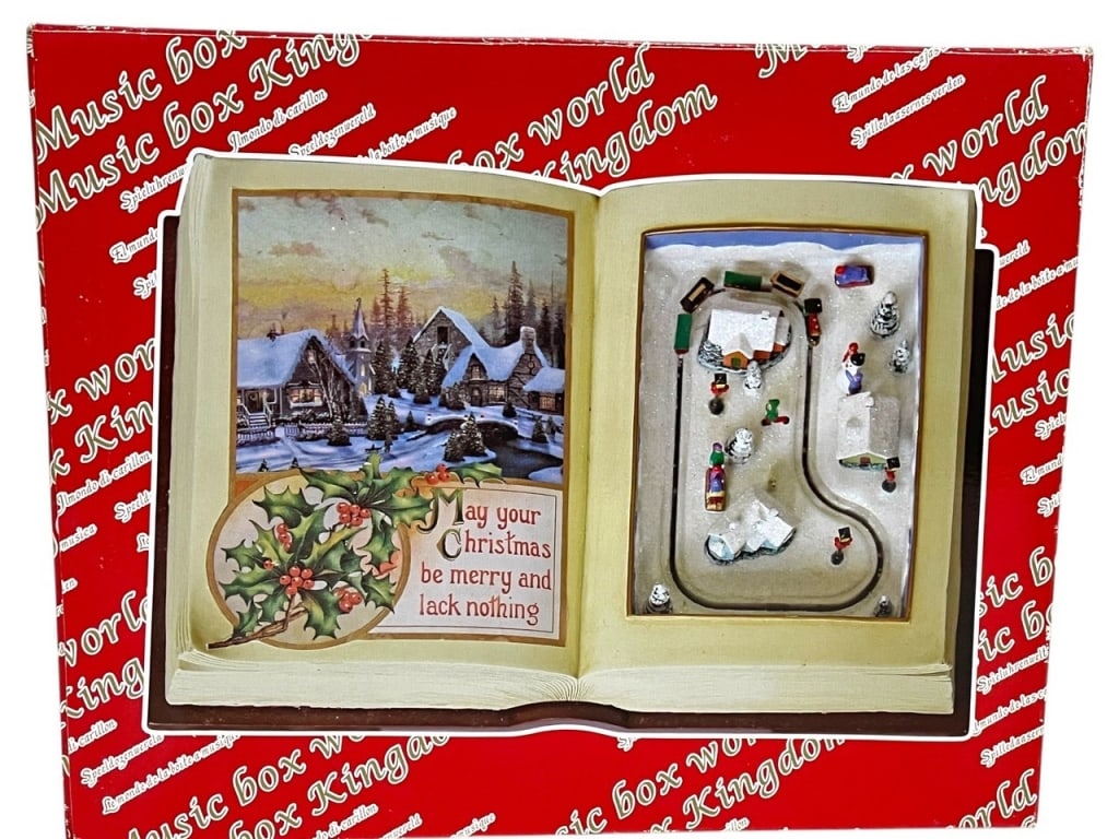 NEW! MUSICBOX KINGDOM CHRISTMAS BOOK MUSIC BOX: NEW! MUSIC BOX KINGDOM CHRISTMAS STORYBOOK MUSIC BOX -NEW IN BOX -DP12224 ***Please note that due to limited storage space, all items must be picked up within 14 days of the auction's conclusion or th