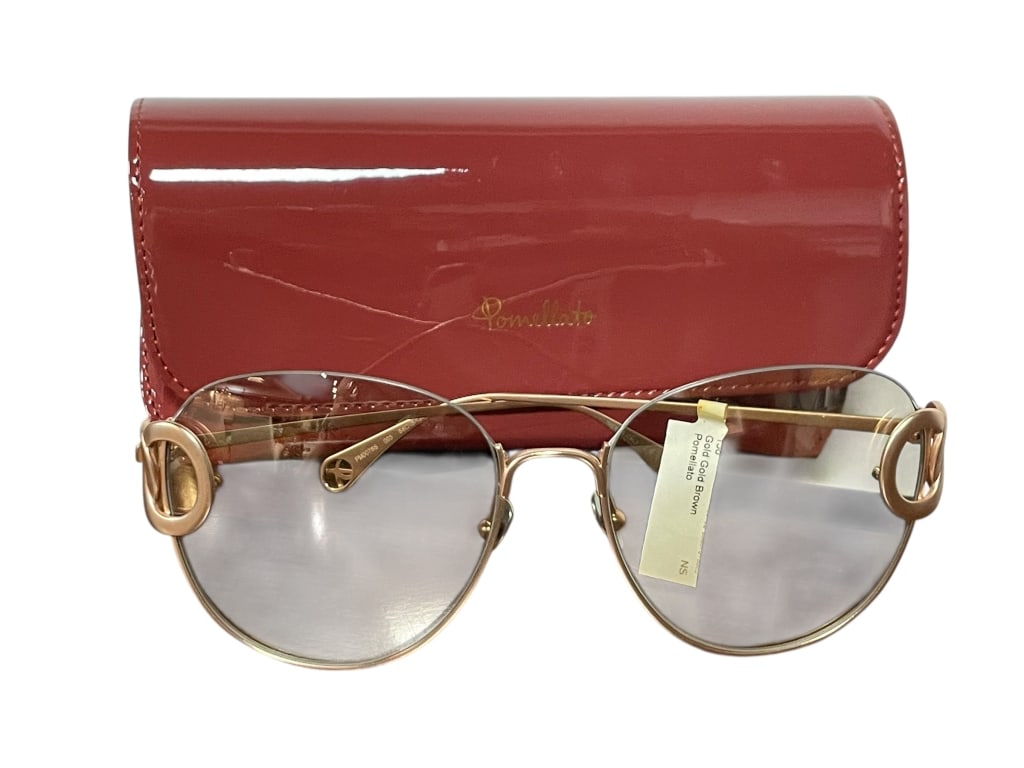 VINTAGE NEW POMELLATO WIRE FRAME GLAM SUNGLASSES: POMELLATO SUNGLASSES - vintage but new with tags - never used - gold brown colors - made in italy - comes with designer signed case - excellent condition - original retail $745 By bidding on this list