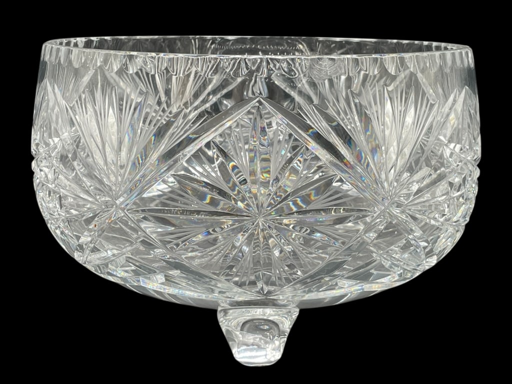 CUT CRYSTAL THREE-FOOTED CENTER BOWL 11": CUT CRYSTAL THREE-FOOTED CENTER BOWL 11" -Very good pre owned condition -Approx 7"h x 11"w -A stunning heavy cut crystal three-footed center bowl showcasing brilliant starburst and fan motifs that cat