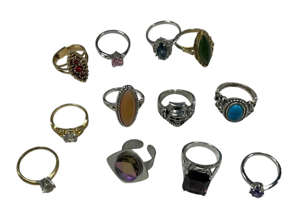 LOT OF 12 VINTAGE COSTUME RINGS VARIETY STONES +: - 12 TOTAL vintage costume rings - VARIOUS STONES and details - various sizes, some adjustable - in good vintage condition - all silver tone or gold tone in coloration By bidding on this listing, you 