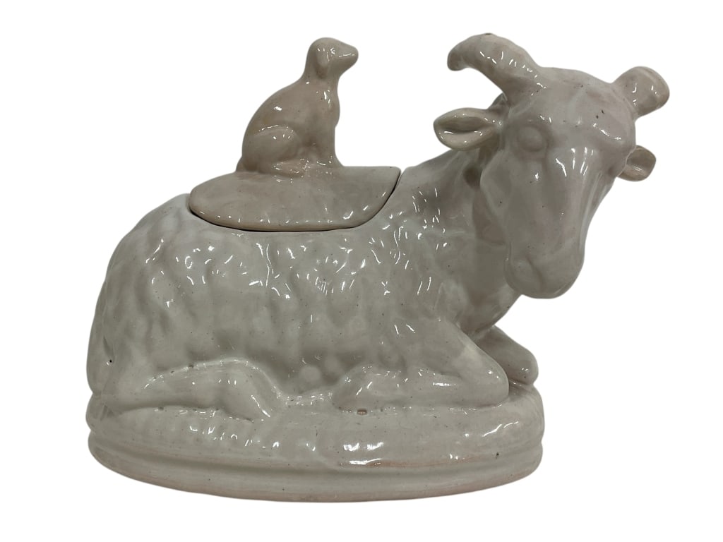 VINTAGE CERAMIC RAM TUREEN WITH LID 12": VINTAGE CERAMIC RAM TUREEN WITH LID 12" -Very good pre owned condition -Approx 9"h x 12"w -This charming vintage ceramic tureen features a sculpted reclining ram form with curled horns and textured wo
