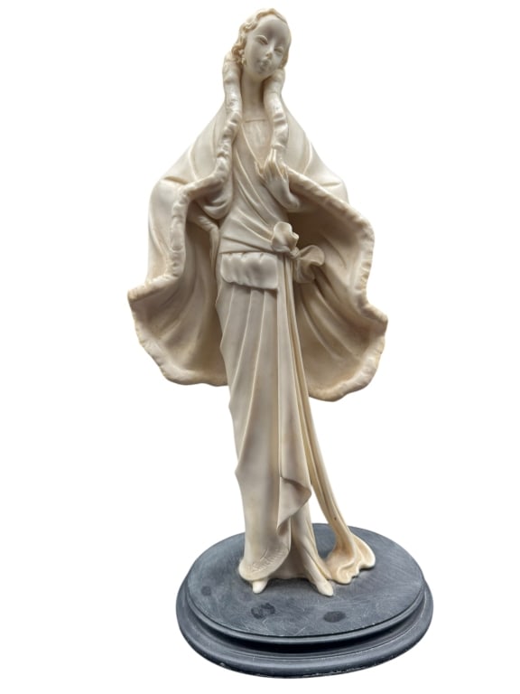 SIGNED SAUTINI SCULPTURE – CLASSICAL WOMAN: SIGNED SAUTINI SCULPTURE – CLASSICAL WOMAN -A graceful sculpture signed Sautini, depicting a serene classical woman draped in flowing robes with an elegant posture and soft facial expression. The cr