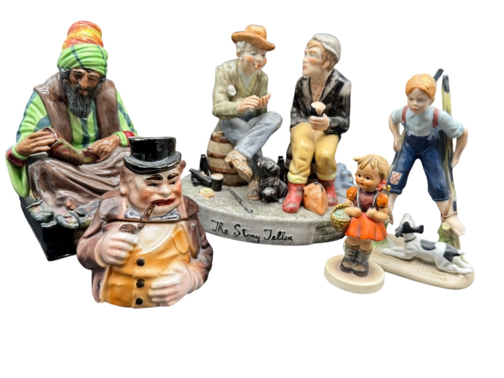 GROUP OF SIX VINTAGE FIGURINES: GROUP OF SIX VINTAGE FIGURINES -This charming mixed lot of six vintage figurines includes a colorful seated artisan in vibrant striped robes, a humorous character jar of a gentleman with top hat and p
