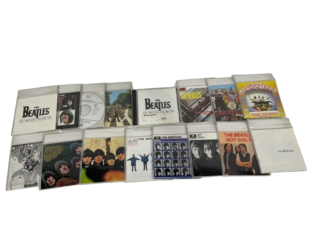 THE BEATLES CD COLLECTION – 16 ALBUM LOT: THE BEATLES CD COLLECTION – 16 ALBUM LOT INCLUDING ABBEY ROAD, SGT. PEPPER, REVOLVER, HELP!, RUBBER SOUL, MAGICAL MYSTERY TOUR, PAST MASTERS & MORE -Extensive 16-CD Beatles collection featuring many