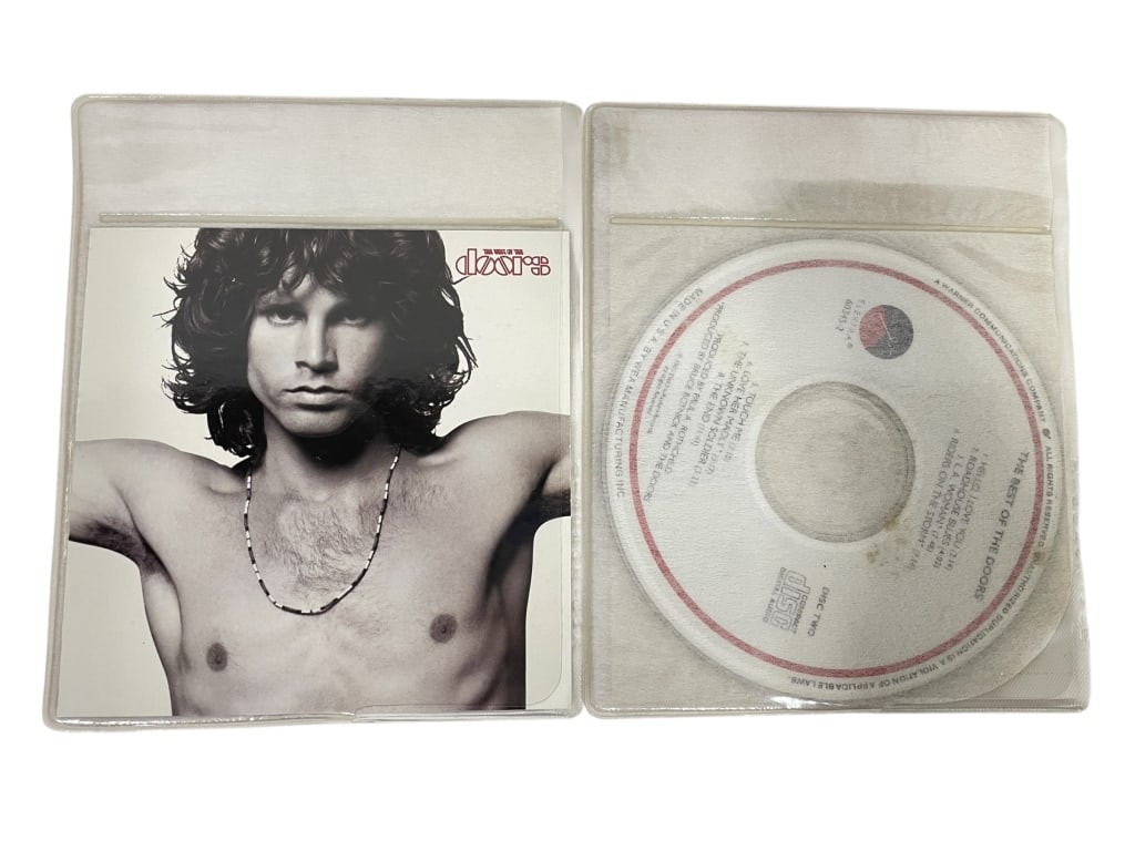 THE DOORS – “THE BEST OF THE DOORS?? CD LOT: THE DOORS – “THE BEST OF THE DOORS” CD LOT -Classic compilation CD featuring The Doors, showcasing Jim Morrison’s unmistakable voice and the band’s defining blend of rock, blues, and psy