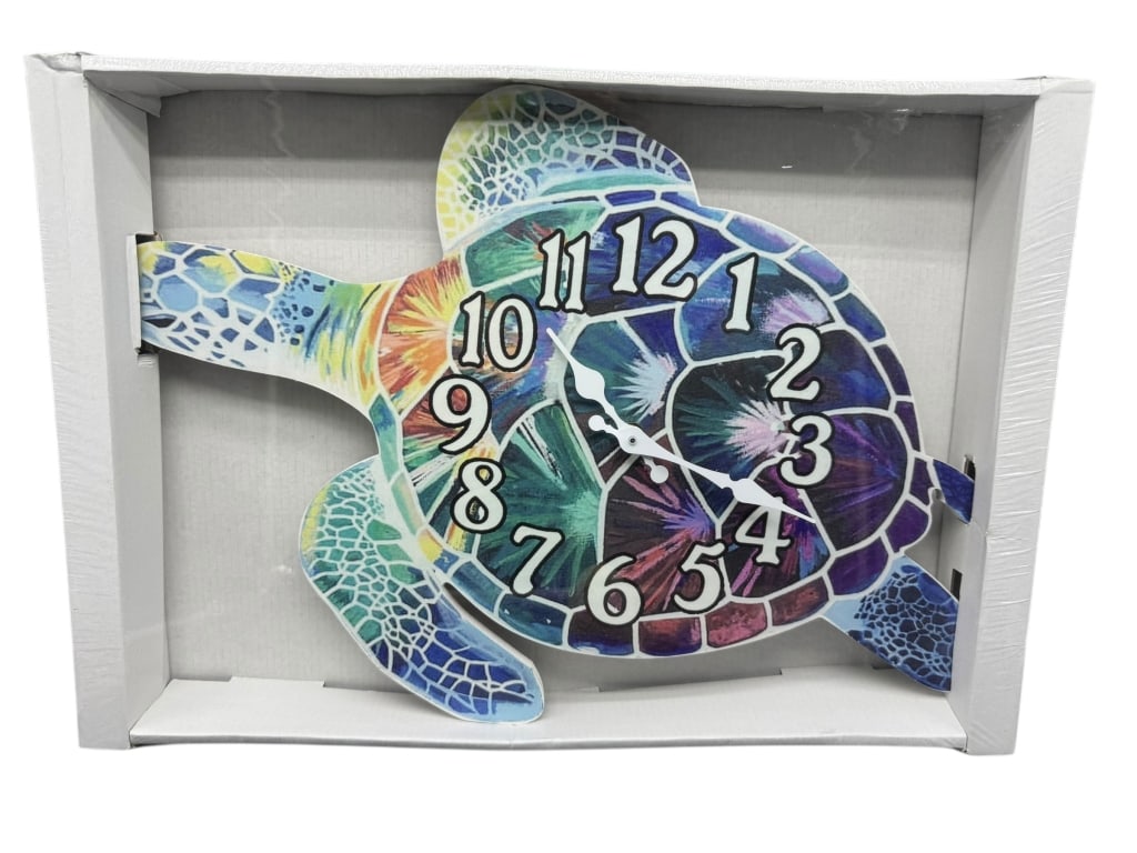 SEA TURTLE WALL CLOCK — NEW IN BOX: SEA TURTLE SHAPED WALL CLOCK WITH VIBRANT MULTICOLOR DESIGN – NEW IN BOXEye-catching wall clock shaped like a sea turtle, featuring bold tropical hues and large readable numerals. New in box and rea