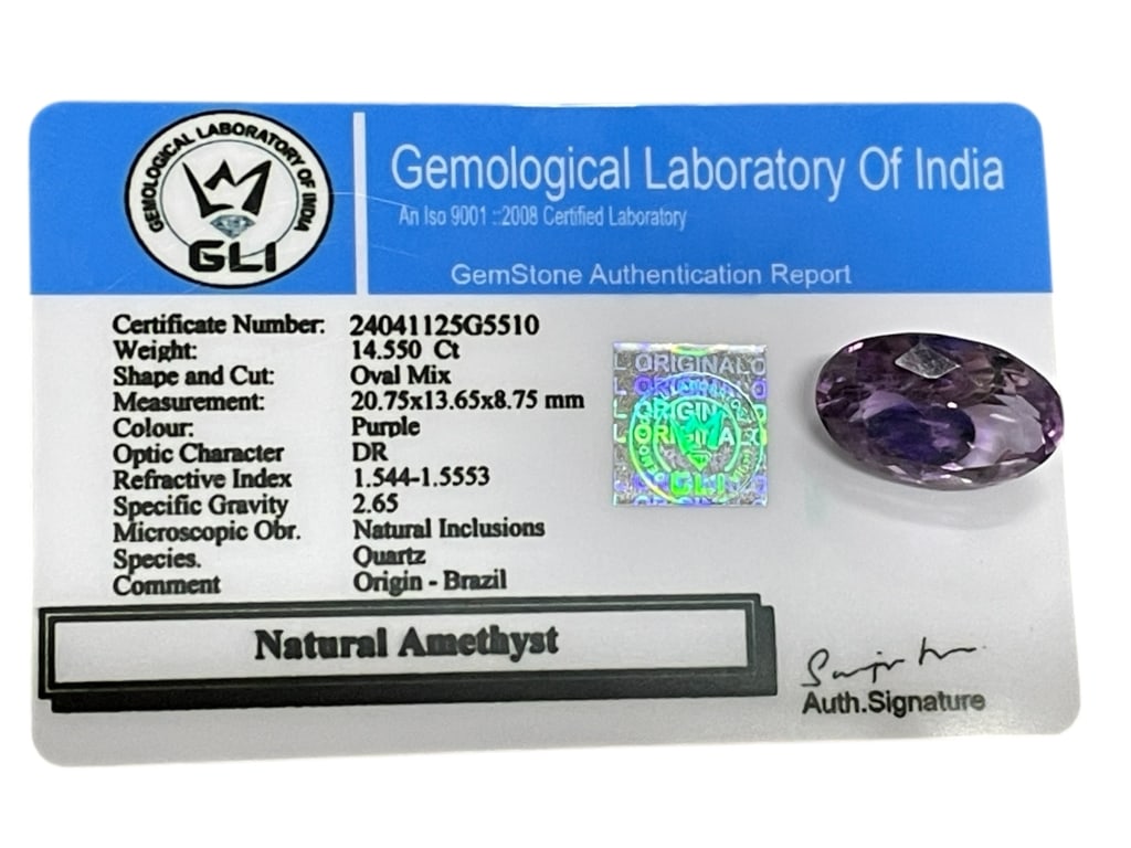 NATURAL AMETHYST OVAL CUT WITH GLI CERT 14.55 CT: NATURAL AMETHYST OVAL CUT WITH GLI CERTIFICATE – 14.55 CT -Striking natural amethyst presented with an official Gemological Laboratory of India (GLI) Gemstone Authentication Report, identified as a