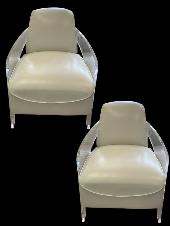 PAIR OF JOHN RICHARDS LUCITE ARMCHAIRS: PAIR OF JOHN RICHARDS LUCITE ARMCHAIRS – A STRIKING FUSION OF MODERN GLAMOUR AND LUXURIOUS COMFORT. THESE HIGH-END ACCENT CHAIRS FEATURE A SLEEK WHITE LEATHER UPHOLSTERY THAT IS PLUSH AND TAILORED,