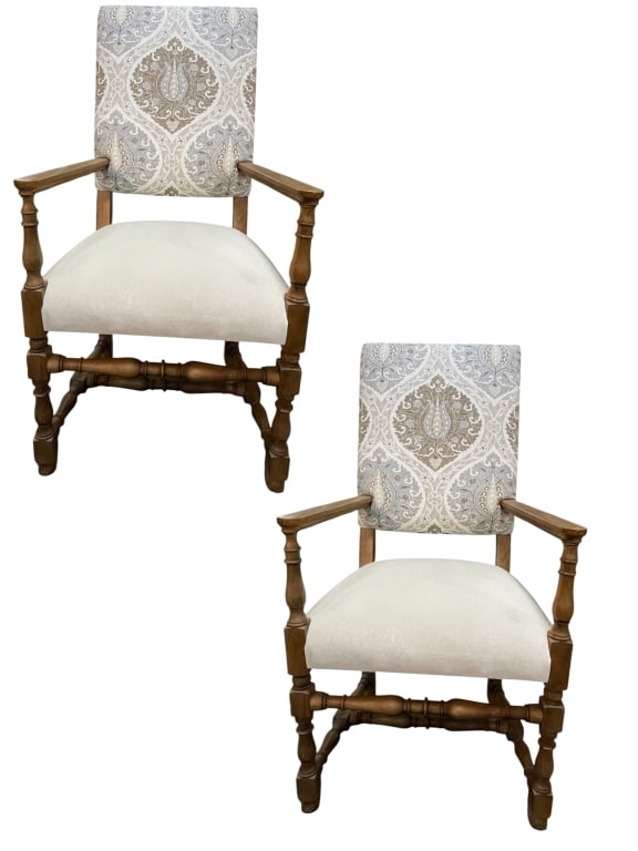 PAIR OF TRADITIONAL UPHOLSTERED ARMCHAIRS: PAIR OF TRADITIONAL UPHOLSTERED ARMCHAIRS – FEATURING TURNED WOOD FRAMES IN A NATURAL FINISH WITH PADDED SEATS AND HIGH, TIGHT BACKS. THE BACKS ARE UPHOLSTERED IN AN ELEGANT DAMASK-STYLE FABRIC IN M