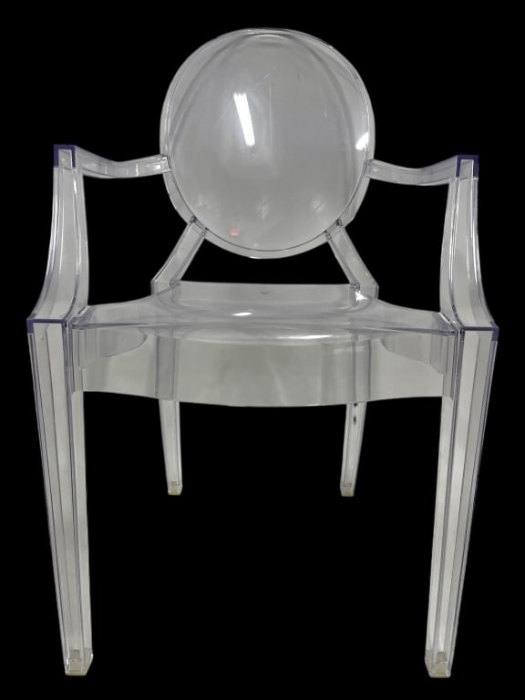 KARTELL LOUIS GHOST ARMCHAIR BY PHILIPPE STARCK: KARTELL LOUIS GHOST ARMCHAIR BY PHILIPPE STARCK — ICONIC TRANSPARENT LUCITE DESIGNER CHAIR MARKED KARTELL MILANO. THIS MODERN CLASSIC FEATURES A SINGLE-MOLD POLYCARBONATE CONSTRUCTION WITH A ROUND B