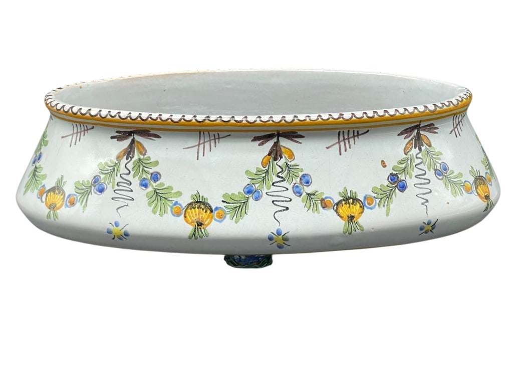 HENRIOT QUIMPER HAND-PAINTED FOOTED BOWL 8": HENRIOT QUIMPER HAND-PAINTED FOOTED BOWL FRANCE -This charming hand-painted faience bowl is attributed to Henriot Quimper, France, featuring a classic Breton floral garland motif with yellow flowers,