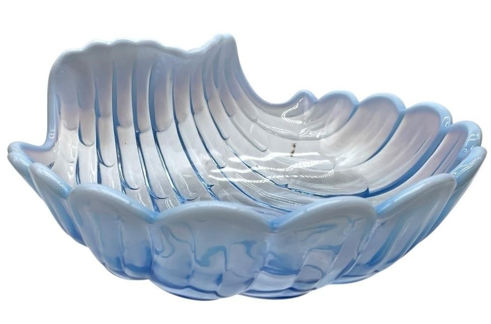 VINTAGE BLUE GLASS OPALESCENT SEASHELL BOWL 11": VINTAGE BLUE GLASS OPALESCENT SEASHELL BOWL 11" -VERY GOOD PRE OWNED CONDITION -APPROX 11" X 5" -A STUNNING BLUE OPALESCENT GLASS SHELL BOWL WITH A BEAUTIFULLY SCALLOPED DESIGN AND A TRANSLUCENT, IRID