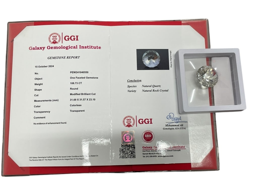 GGI CERT 108.73 CARAT NATURAL ROCK CRYSTAL QUARTZ: GGI CERTIFIED 108.73 CARAT NATURAL ROCK CRYSTAL QUARTZ – LARGE MODIFIED BRILLIANT ROUND CUT -This impressive certified natural rock crystal quartz weighs 108.73 carats and is cut into a dazzling mod