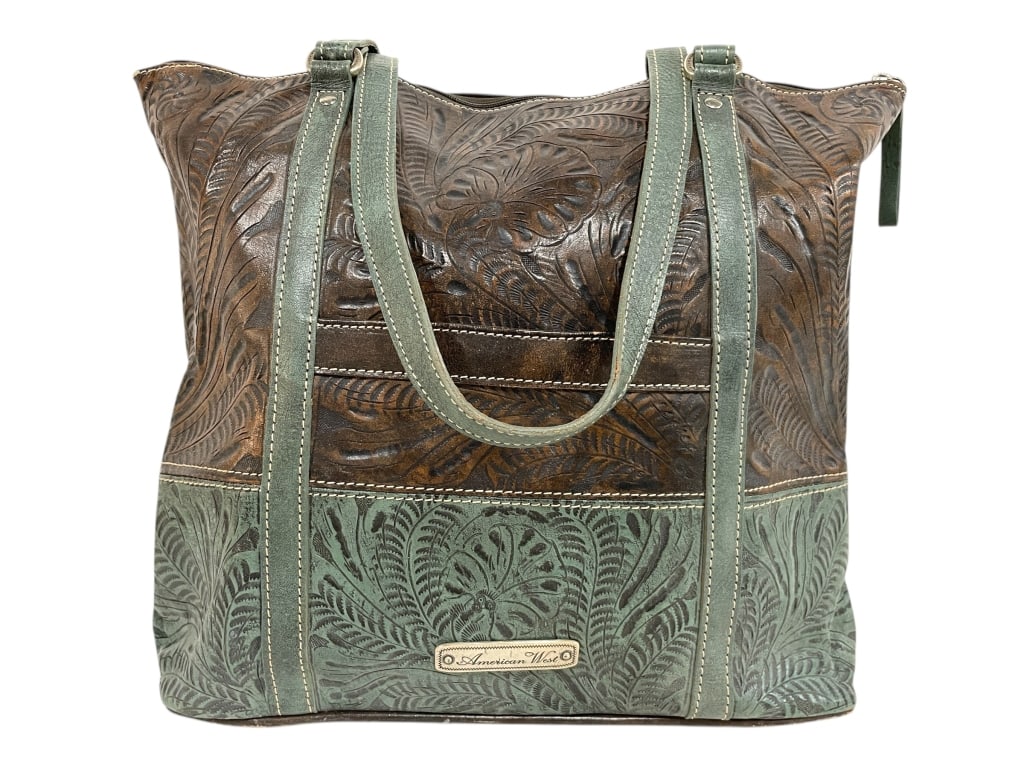 AMERICAN WEST EMBOSSED LEATHER TOTE HANDBAG: AMERICAN WEST EMBOSSED LEATHER TOTE HANDBAG IN BROWN & SAGE GREEN -Very good pre owned condition -Approx 13"h x 14"w -This quality leather tote by American West features a richly tooled floral and scr