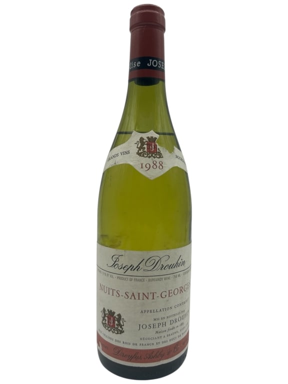 JOSEPH DROUHIN NUITS-SAINT-GEORGES 1988 11.5": - VINTAGE 1988 JOSEPH DROUHIN NUITS-SAINT-GEORGES. THIS APPELLATION-CONTROLLED WINE IS HIGHLY REGARDED FOR ITS COMPLEXITY, BALANCED STRUCTURE, AND LONGEVITY. COLLECTIBLE CONDITION WITH VISIBLE LABEL A