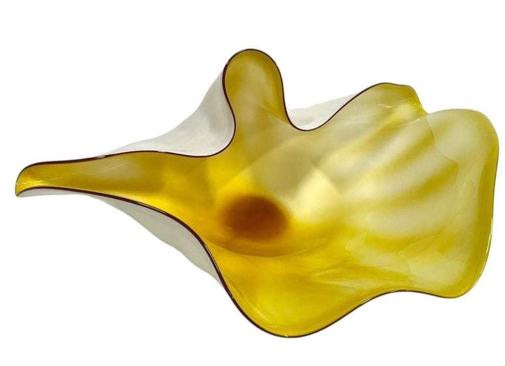 MURANO STYLE ART GLASS FREEFORM BOWL 21": MURANO STYLE ART GLASS FREEFORM BOWL 21" -GOOD PRE OWNED CONDITION, SMALL CHIP (SEE PHOTOS) -APPROX 21" X 16.5" -STRIKING HAND-BLOWN GLASS BOWL IN A FLOWING ORGANIC FORM WITH A RICH AMBER-YELLOW INTER
