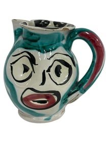 DECORATIVE SIGNED ABSTRACT FACE POTTERY PITCHER 4"