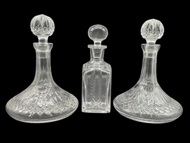 GROUP OF 3 CUT CRYSTAL DECANTERS WITH STOPPERS