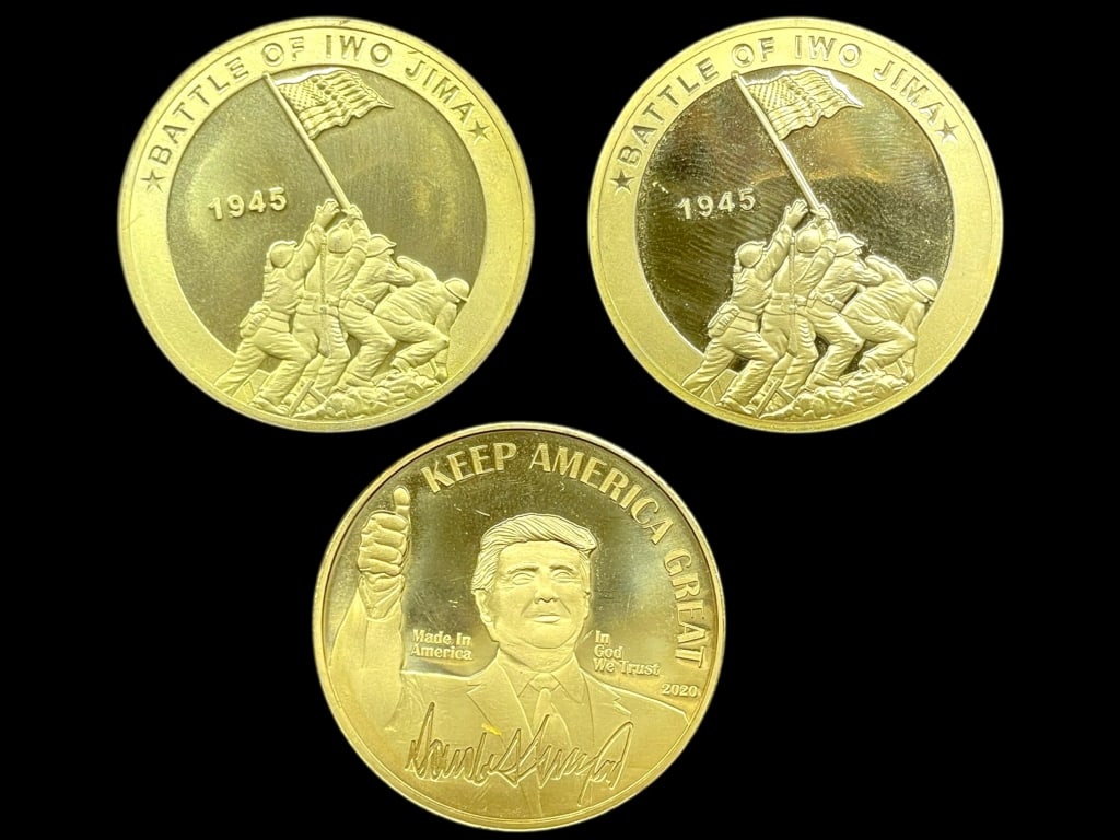 IWO JIMA , DONALD TRUMP COMMEMORATIVE COINS: IWO JIMA COMMEMORATIVE COINS & DONALD TRUMP COMMEMORATIVE COIN / CHALLENGE COINS – LOT OF 3 -This lot includes two Iwo Jima commemorative collectible coins honoring the heroic 1945 flag-raising at M