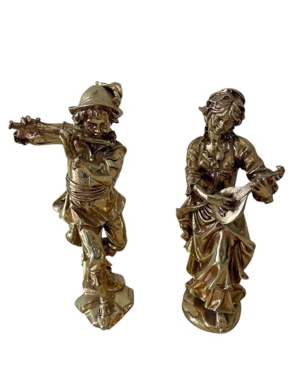 PAIR OF VINTAGE GILT MUSICIANS FIGURINES 11": PAIR OF VINTAGE GILT MUSICIANS FIGURINES 11" -Good pre owned condition, one figurie has chip on leg (see photos) -Approx 11"h x 4"w -Elegant matching sculptures depicting a male flutist and a female l
