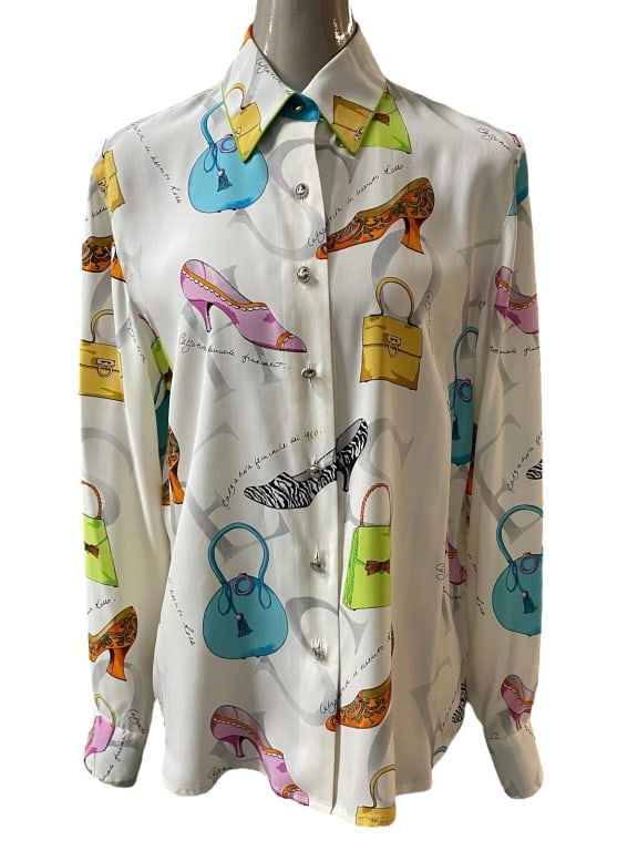 SAKS FIFTH AVENUE COLLECTION 100% SILK BLOUSE SZ10: SAKS FIFTH AVENUE COLLECTION 100% SILK BLOUSE SZ10 -Good pre owned condition, some stains (see photos) -Size 10 -100% silk -A chic statement piece that transitions effortlessly from office to evening