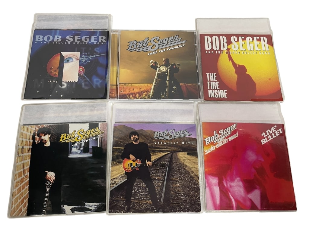 BOB SEGER & THE SILVER BULLET BAND – LOT OF 6 CDS: BOB SEGER & THE SILVER BULLET BAND – LOT OF 6 CLASSIC ROCK CDs INCLUDING GREATEST HITS & LIVE BULLET -Fantastic lot of six Bob Seger CDs, featuring a mix of studio albums, greatest hits, and his ico