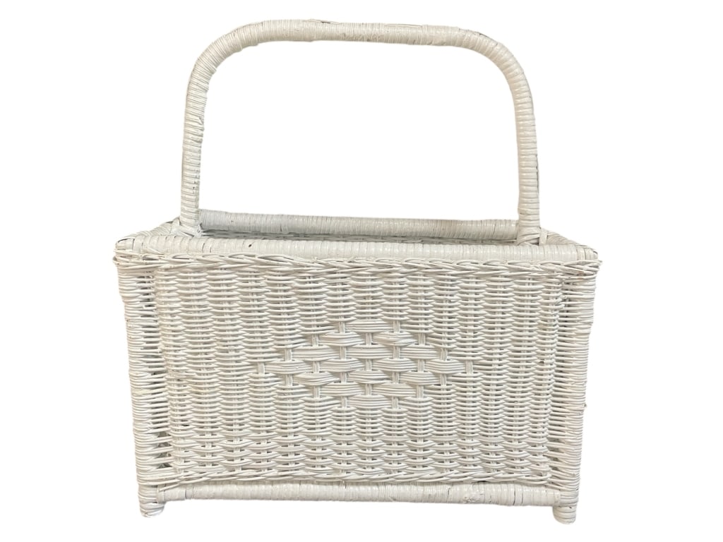 WHITE WICKER MAGAZINE BASKET W HANDLE 18": WHITE WICKER MAGAZINE BASKET W HANDLE 18" -Very good pre owned condition -Approx 18"h x 16"w x 8"d -This charming white woven wicker basket features a structured rectangular form with a sturdy wrapped