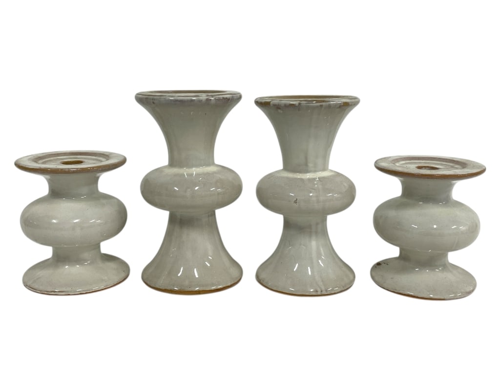 4 MODERN CERAMIC CANDLE HOLDERS: 4 MODERN CERAMIC CANDLE HOLDERS -Very good pre owned condition -Set of four: 2 Small at 6"h x 4.5"w, 2 Large at 9"h x 4.5"w -Stylish set of four mid-century modern ceramic candle holders featuring scu