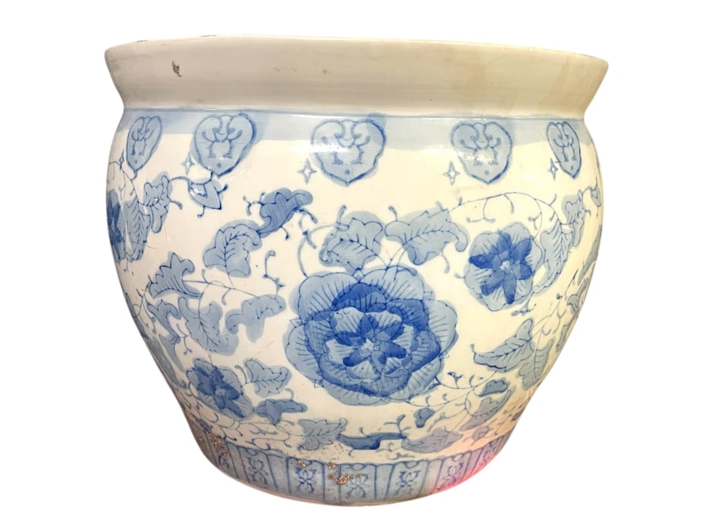 BLUE AND WHITE FLORAL CERAMIC JARDINIERE 14": BLUE AND WHITE FLORAL CERAMIC JARDINIERE 14" -Very good pre owned condition -Approx 12"h x 14"w -This classic blue and white ceramic jardinière features a gently rounded form decorated with hand-pain