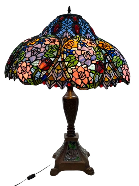 TIFFANY STYLE ROSE GARDEN LEADED GLASS TABLE LAMP: TIFFANY STYLE ROSE GARDEN LEADED GLASS TABLE LAMP -Tiffany style leaded glass table lamp showcasing a classic rose garden design with layered pink blossoms, green leaves, and amber accents arranged in