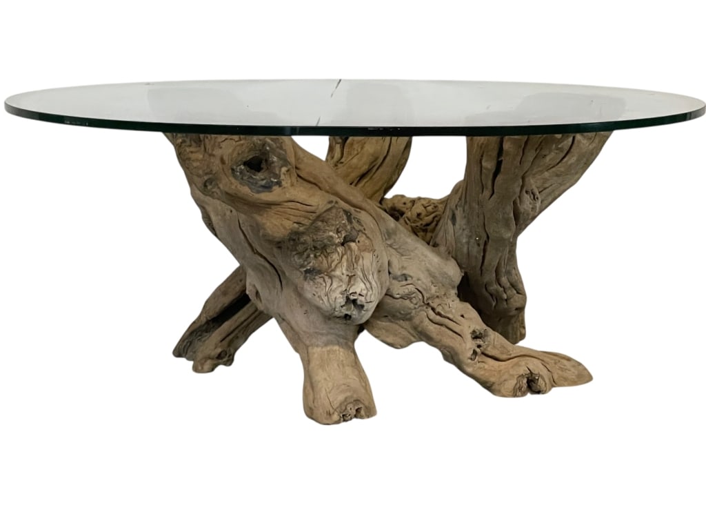 VINTAGE DRIFTWOOD COFFEE TABLE 37": VINTAGE DRIFTWOOD COFFEE TABLE FEATURING A NATURAL ORGANIC BASE OF WEATHERED DRIFTWOOD ROOTS SUPPORTING A CIRCULAR BEVELED GLASS TOP. THE RUSTIC CHARACTER OF THE WOOD CONTRASTS BEAUTIFULLY WITH THE