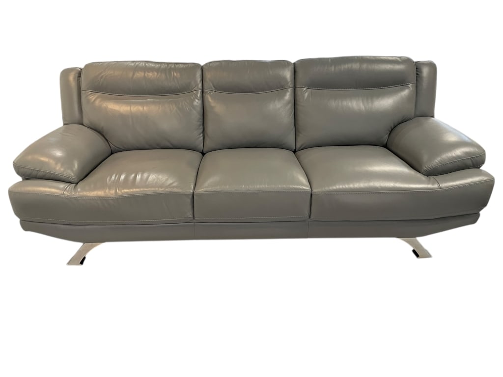 SOFIA VERGARA MODERN GRAY LEATHER SOFA 89": MODERN GRAY LEATHER THREE-SEAT SOFA WITH METAL BASE-Spacious three-seat gray leather sofa with padded back cushions, wide armrests, and a sleek metal base that enhances its modern profile. Designed