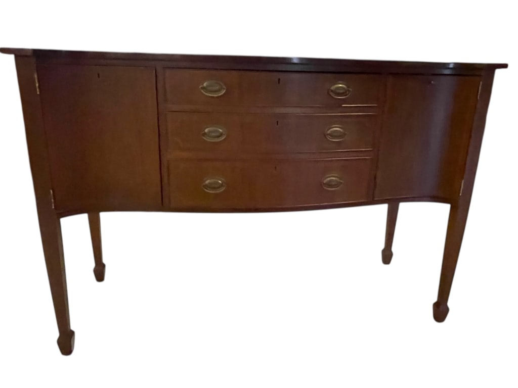 KITTINGER OLD DOMINION MAHOGANY SIDEBOARD 54": KITTINGER OLD DOMINION MAHOGANY SIDEBOARD -This classic Kittinger Old Dominion mahogany sideboard features a beautifully bowed front with three graduated center drawers, flanked by two deep side cabin