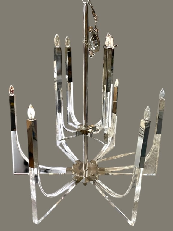 LARGE MID MOD LUCITE AND CHROME CHANDELIER 42": LARGE MID MOD LUCITE AND CHROME CHANDELIER -Striking large-scale contemporary chandelier featuring a dramatic sculptural form composed of clear lucite arms paired with polished metal accents. The mult