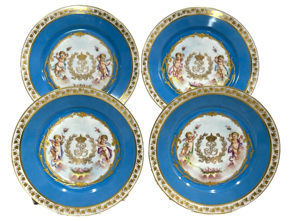 SET OF 4 SEVRES PORCELAIN PLATES 9": SET OF 4 SEVRES PORCELAIN PLATES 9" -VERY GOOD PRE OWNED CONDITION -SET OF 4 PLATES -APPROX 9" -STUNNING SKY BLUE BORDERS WITH GOLD GILDING AND CENTRAL CARTOUCHE FEATURING CHERUBS AND FLORAL GARLANDS.