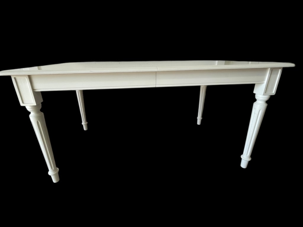 WHITE PAINTED TRADITIONAL TABLE WITH TURNED LEGS: WHITE PAINTED TRADITIONAL TABLE WITH TURNED LEGS-This classic white-painted dining table features a long rectangular top supported by elegantly turned legs, offering a timeless traditional