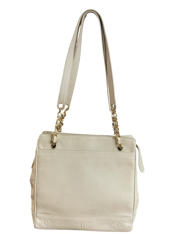 CHANEL TRIPLE CC BEIGE CAVIAR LEATHER TOTE BAG: CHANEL TRIPLE CC BEIGE CAVIAR LEATHER TOTE BAG-Good pre owned condition, see photos-Approx 13"l x 3.5"w x 12"h-Elegant Chanel tote bag crafted in durable beige caviar leather with subtle stitched CC