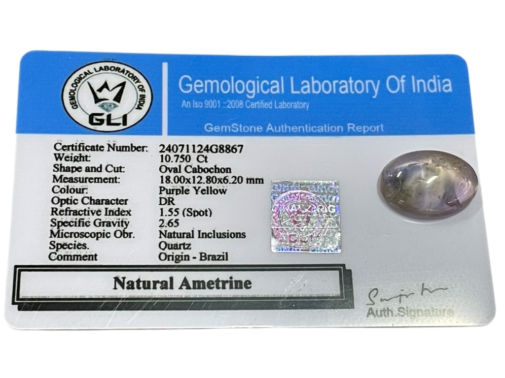 NATURAL AMETRINE OVAL CABOCHON 10.75 CT GLI CERT: NATURAL AMETRINE OVAL CABOCHON 10.75 CT – GLI CERTIFIED-Offered is a natural ametrine oval cabochon weighing approximately 10.750 carats, accompanied by a Gemological Laboratory of India (GLI)