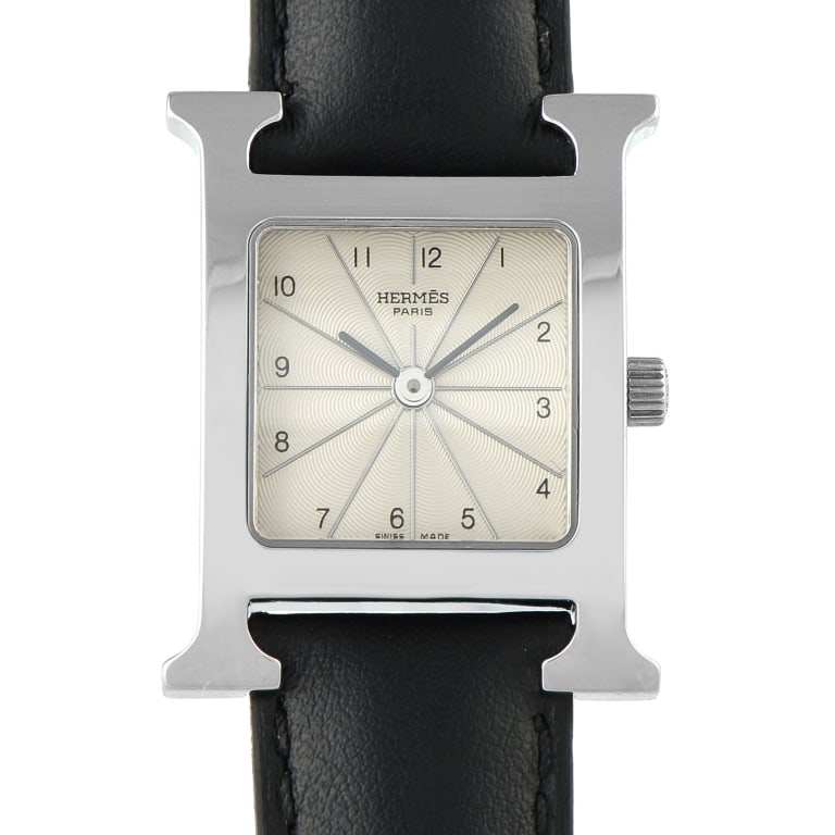 HERMES HEURE H STEEL QUARTZ WATCH RS1.205: Designed for easy elegance, the Hermes Heure H ref. RS1.205 features the signature H steel case paired with interchangeable straps. The watch is equipped with a Swiss quartz movement and an opaline si