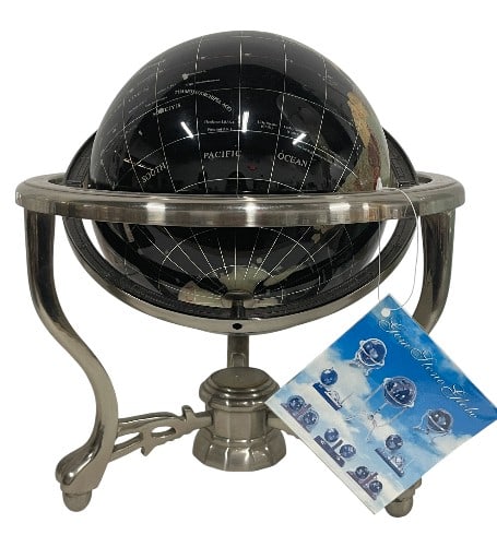 GEMSTONE GLOBE WITH METAL ARMILLARY STAND 14": GEMSTONE GLOBE WITH METAL ARMILLARY STAND 14" -Very good pre owned condition, white mark of metal piece (see photos) -Approx 14"h x 12"w -Striking decorative world globe featuring a glossy black groun