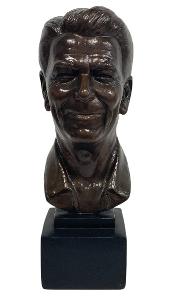 ALVA 1990 BUST OF RONALD REAGAN 18": ALVA 1990 BUST OF RONALD REAGAN 18" -Very good pre owned condition -Approx 18"h x 5.5"w x 5"d -Stylized bronze-tone bust sculpture depicting Ronald Reagan. Finely modeled with expressive facial detail