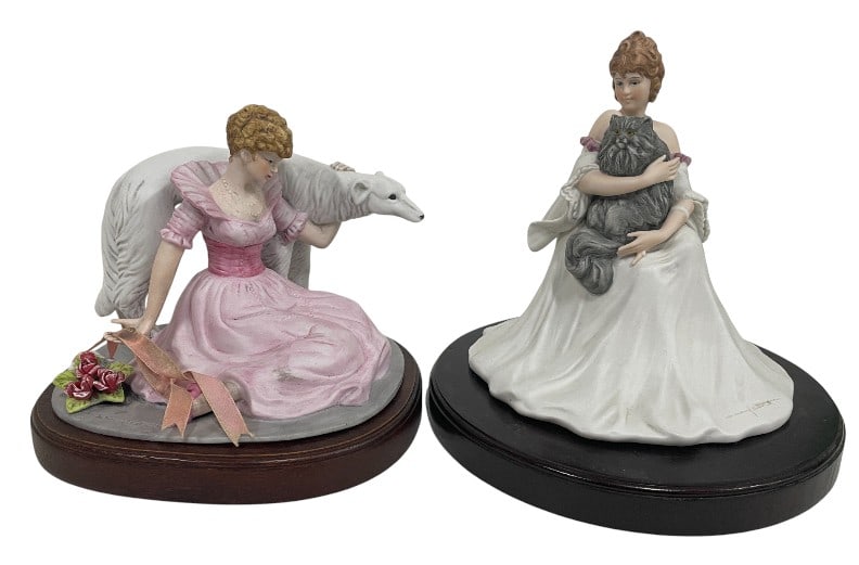 PAIR OF LOUIS ICART PORCELAIN FIGURINES 7": PAIR OF LOUIS ICART PORCELAIN FIGURINES, PART OF "THE HEIRLOOM TRADITION" LIMITED EDITION COLLECTION -Very good pre owned condition -Approx 6" and 7" tall -Elegant pair of limited edition porcelain fi