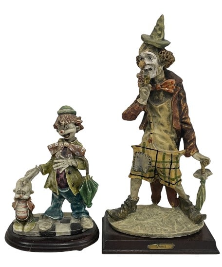 PAIR OF PUCCI CLOWN FIGURINES 13": PAIR OF PUCCI CLOWN FIGURINES 13" -Very good pre owned condition -Approx 10" and 13" tall -Expressive pair of clown figural sculptures featuring two distinct character studies rendered in an Italian-i