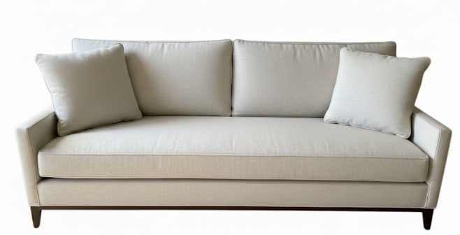 AMBELLA NEUTRAL UPHOLSTERED THREE-SEAT SOFA 81": AMBELLA NEUTRAL UPHOLSTERED THREE-SEAT SOFA 35" X 81" X 49" APPROX -Comfortable three-seat sofa upholstered in a neutral textured fabric with loose seat and back cushions, gently flared arms, and wood